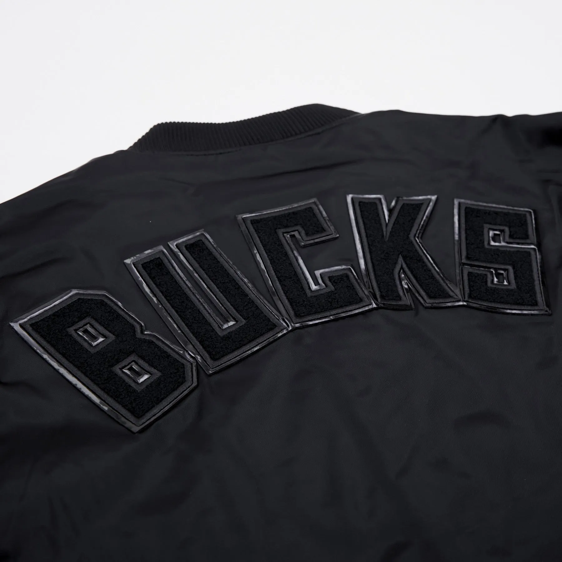 NBA MILWAUKEE BUCKS TRIPLE BLACK PRO MEN'S TRACK JACKET (BLACK)